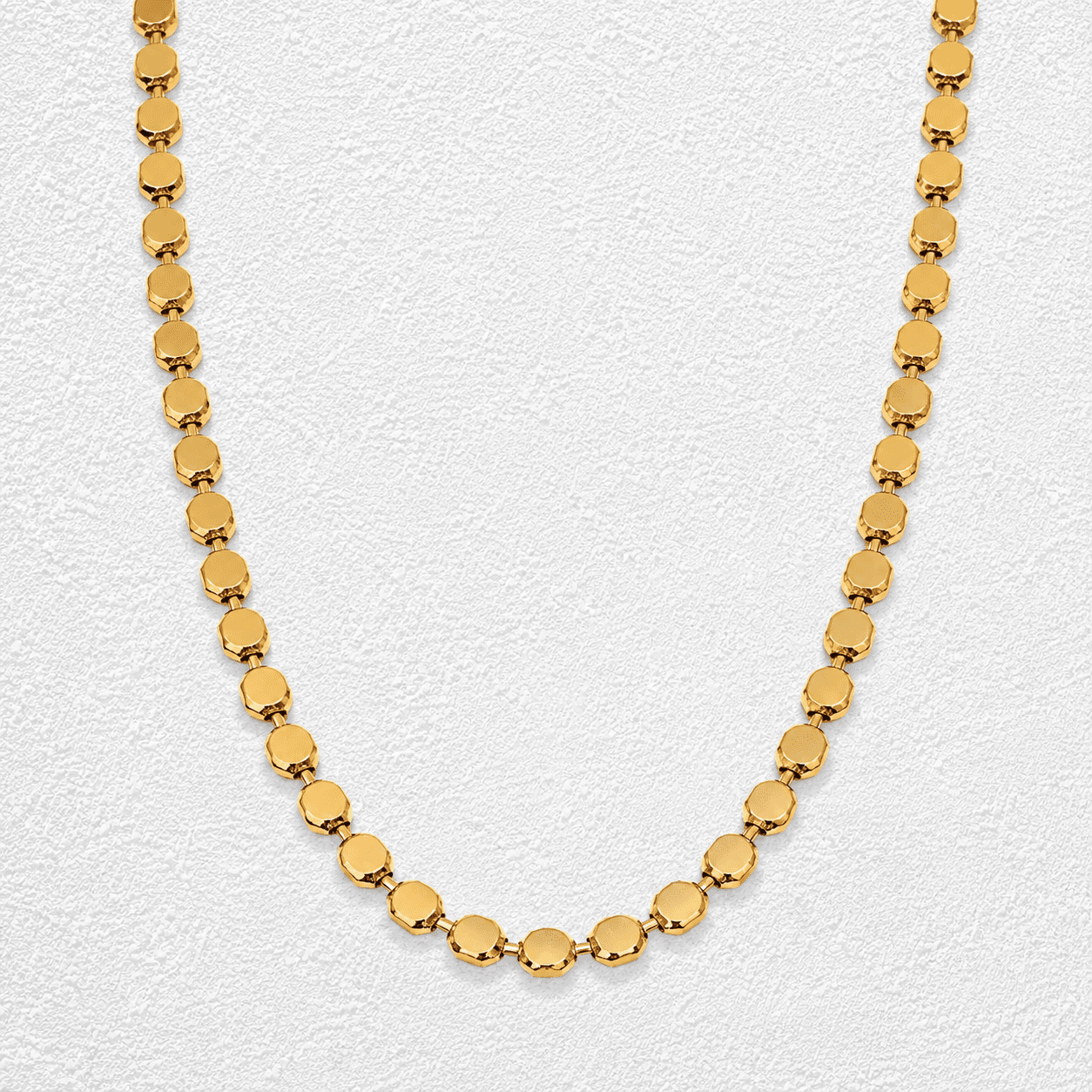 CAMINO DE MEDIANÍAS · Collar de eslabones planos circulares en oro.
