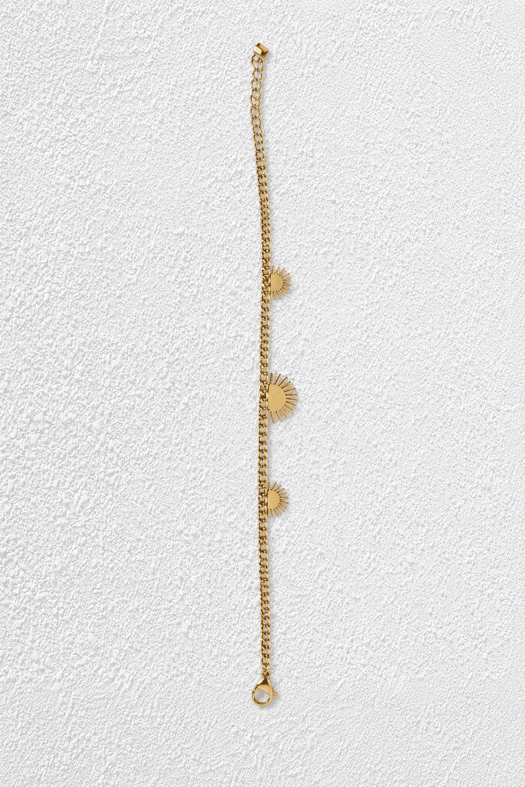 SOLES DE ORO · Pulsera dorada con dijes de sol