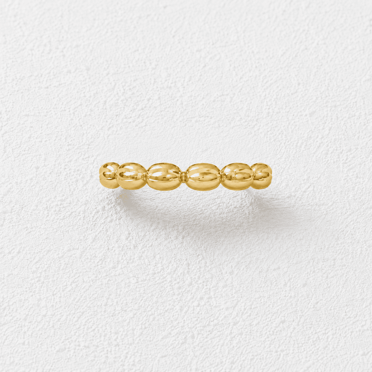 Semillas Anillo · Fila de bolitas ovales · Dorado especular