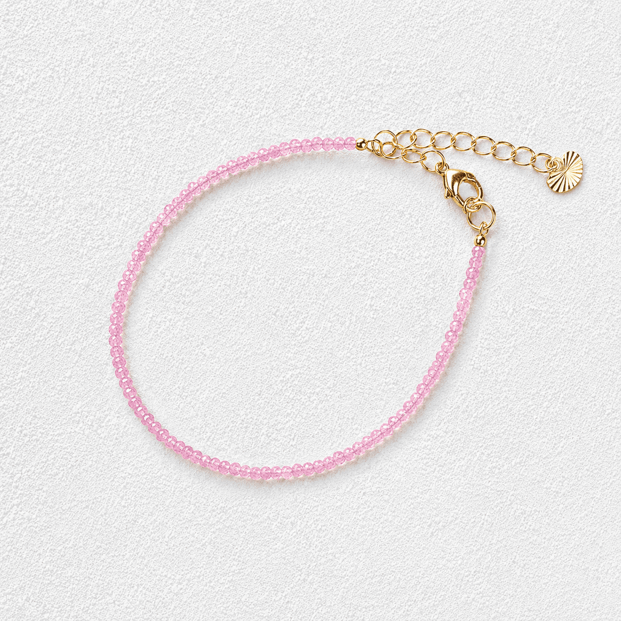 FLOR DE TABAIBA · Pulsera de cuentas facetadas en rosa pálido con cierre dorado