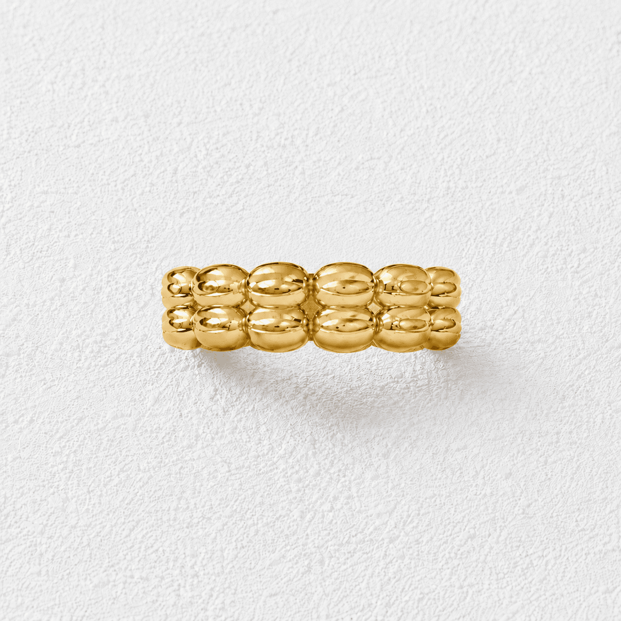 Burbuja Doble Anillo · Doble fila de perlas ovales · Dorado especular
