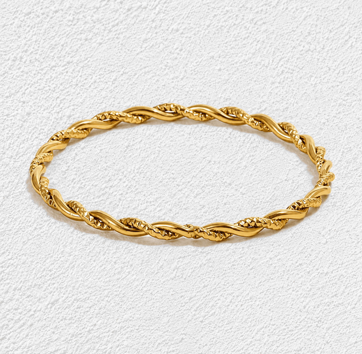 Sequero · Brazalete rígido trenzado con textura