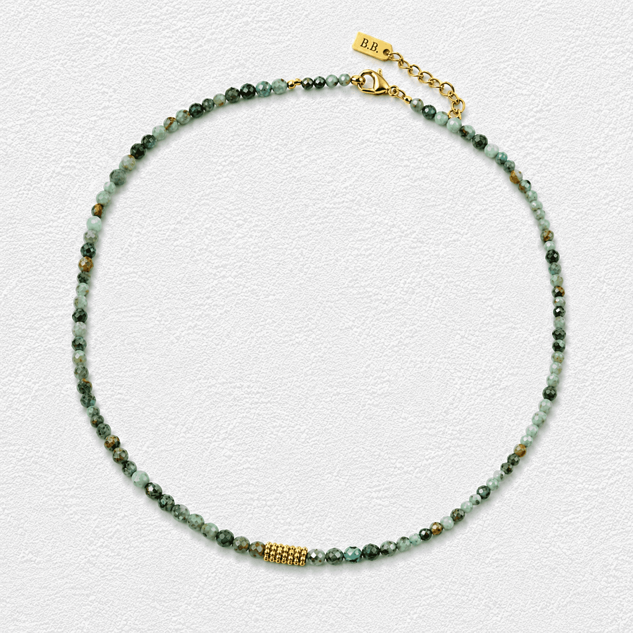 VERDOR DE ANAGA • Collar fino de turquesa africana facetada • con detalle central en oro